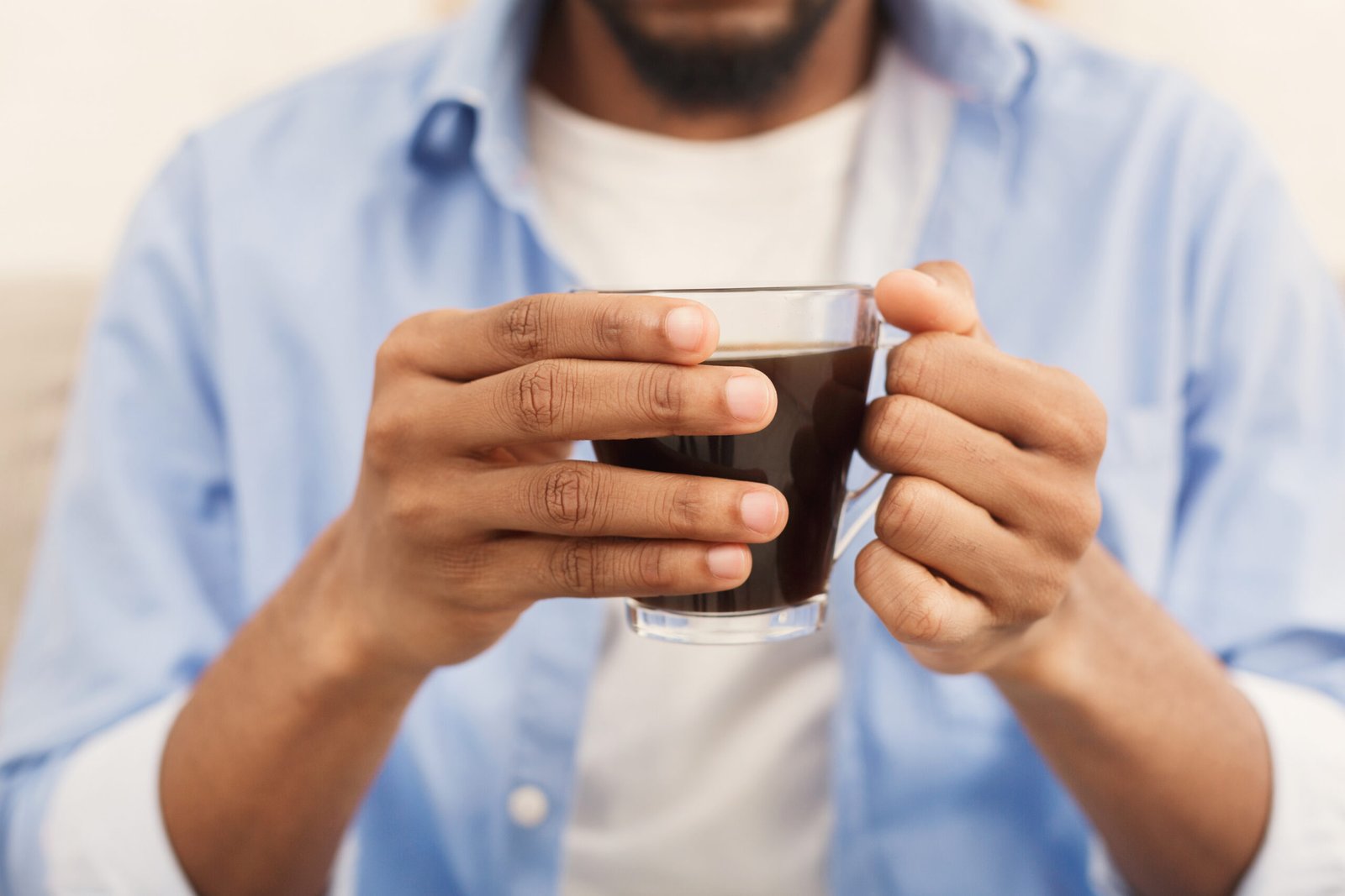 man enjoying cup of coffee