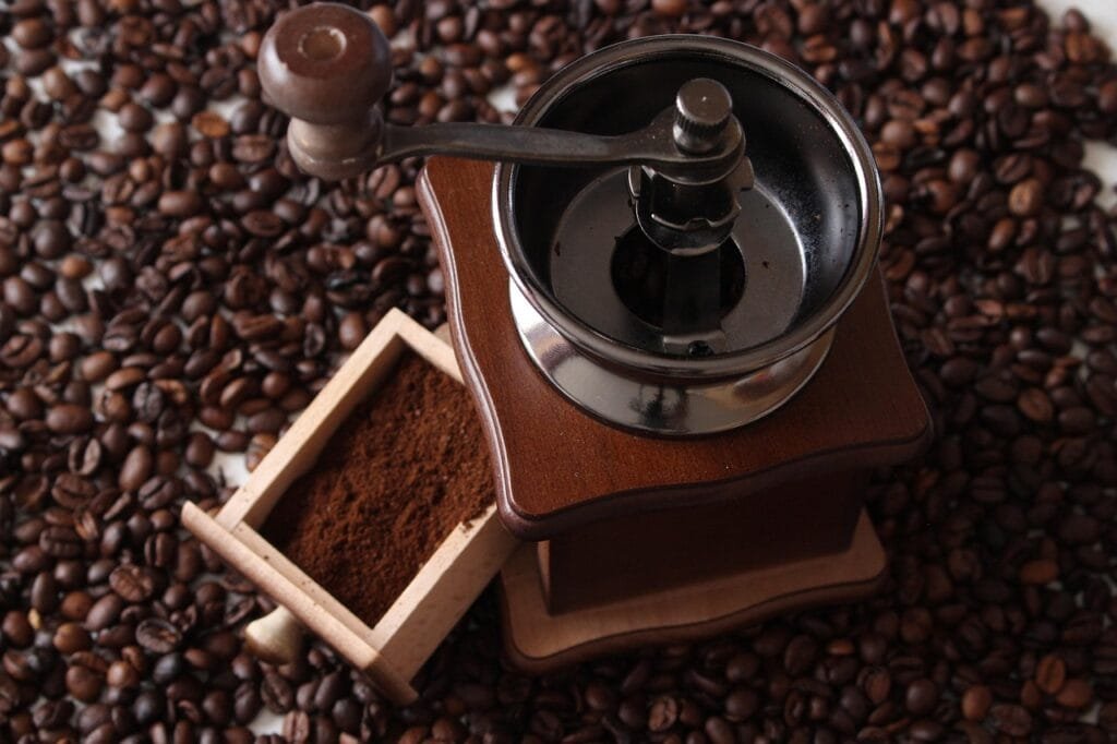 coffee beans and grinder - Best Practices for Grinding Coffee Beans
