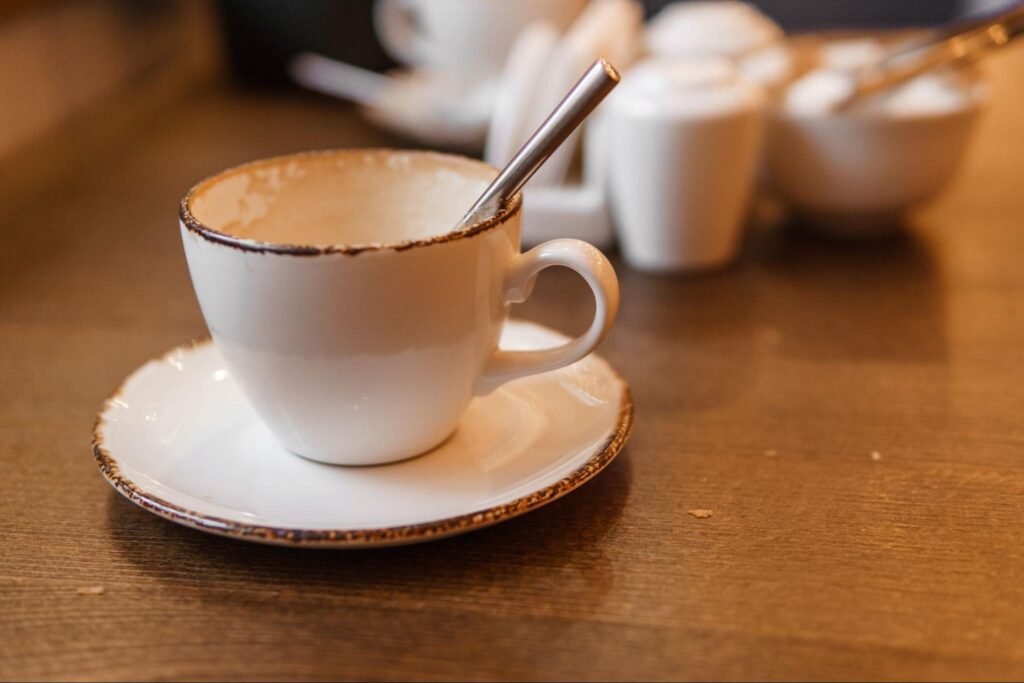 cup of coffee on wooden table, representing a memorable customer experience