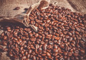 Burlap sack spilling roasted beans